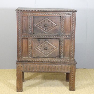 Lot 656 - An antique joined and chip-carved oak double...