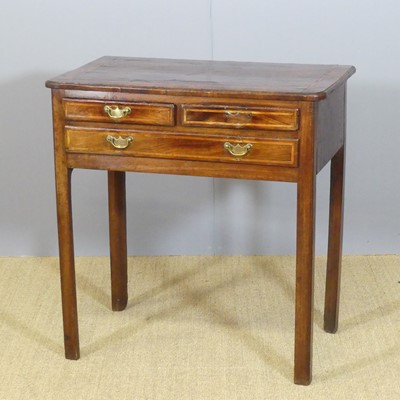 Lot 653 - A provincial George III walnut crossbanded and...