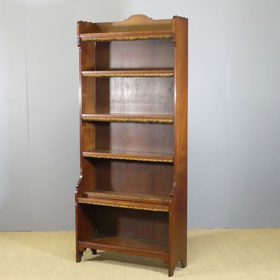 Lot 646 - An Arts & Crafts walnut full-height...
