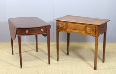 Lot 668 - A provincial George III walnut three drawer...
