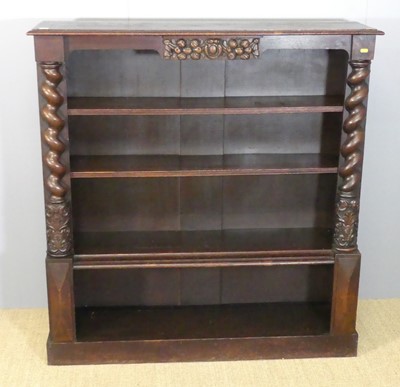 Lot 642 - An early 20th century oak freestanding open...
