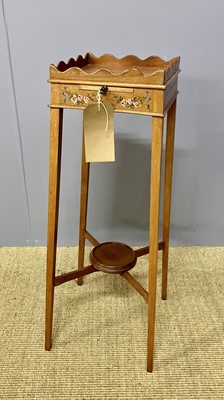 Lot 657 - A mahogany and floral polychrome painted...