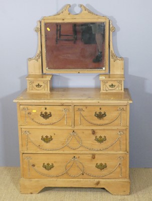 Lot 686 - A late Victorian pine swing mirrorback...