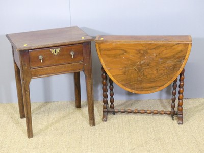 Lot 680 - A provincial walnut low single drawer...