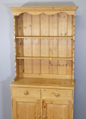 Lot 600 - A modern pine compact kitchen dresser, h.196cm,...