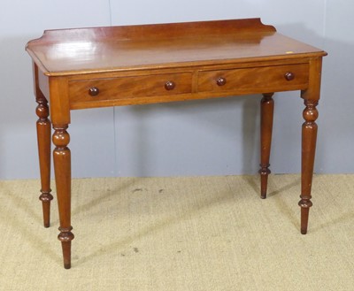 Lot 683 - A mid-Victorian mahogany ledgeback round...