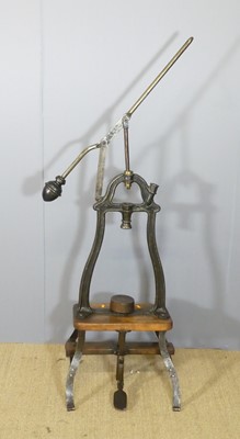 Lot 597 - A vintage French cast iron and stained wood...