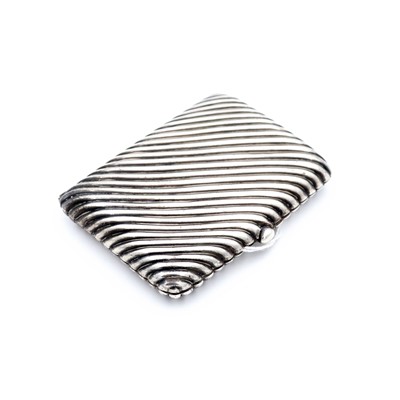 Lot 201 - An Edwardian silver cigarette case, of curved...