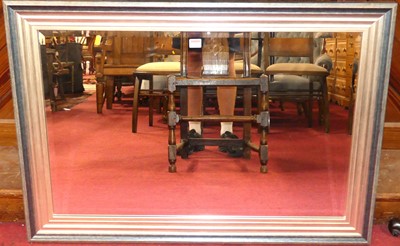 Lot 596 - A contemporary silvered framed bevelled...