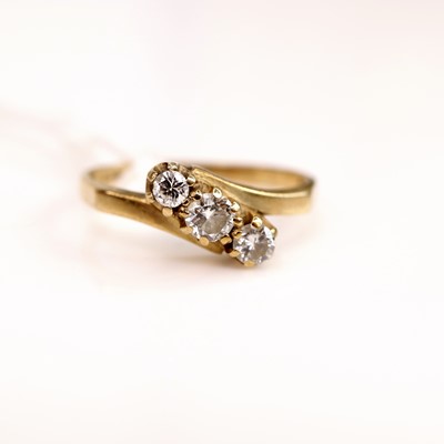 Lot 271 - A 9ct gold diamond trilogy ring, total diamond...