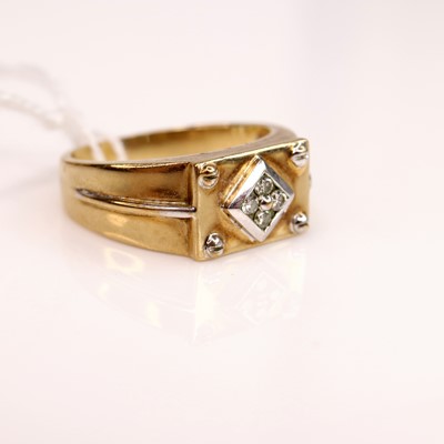 Lot 274 - A gent's 9ct gold diamond set signet ring, the...