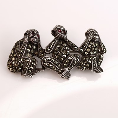 Lot 280 - A 1920s silver and marcasite set brooch...