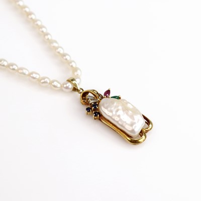 Lot 286 - A Baroque rice pearl necklace, with 14ct gold,...