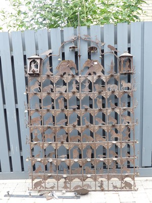 Lot 761 - An ironwork Indian temple panel, the grid-like...