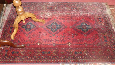 Lot 730 - A Persian woollen Bokhara rug, having a rust...