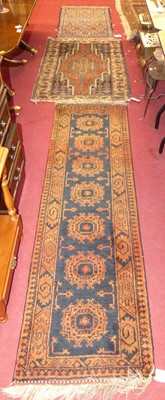 Lot 737 - A Persian woollen Bokhara hall runner, 200 x...