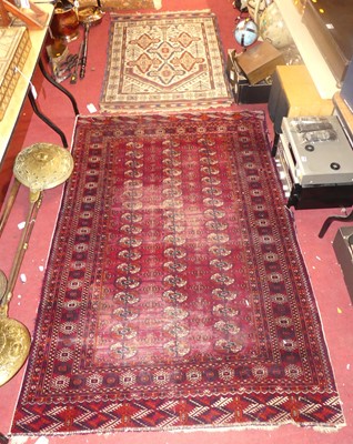 Lot 739 - A Persian woollen red ground Bokhara rug, 121...