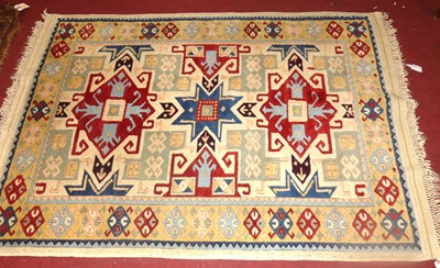 Lot 741 - A Zeigler Kazak woollen rug, having a cream...