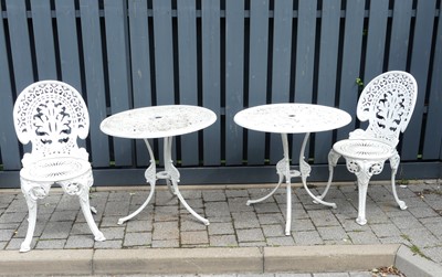 Lot 765 - A white painted alloy metal bistro set,...