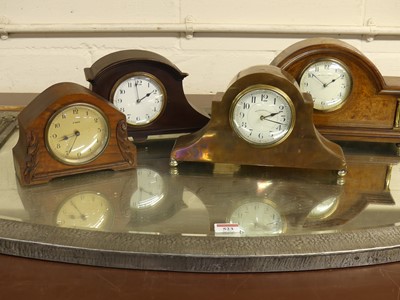 Lot 134 - An Edwardian walnut dome top mantel clock, the...