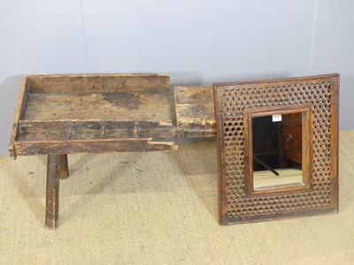 Lot 706 - A rustic stained pine low work seat, width...