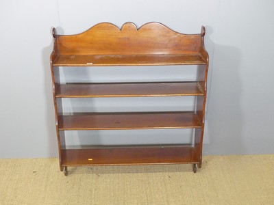 Lot 711 - A mid-Victorian 4-tier wall shelf, having a...