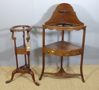 Lot 714 - A 19th century mahogany bow front wash stand,...