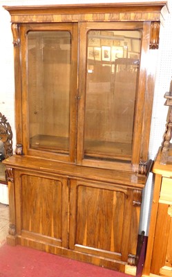 Lot 725 - A Victorian rosewood bookcase cupboard, the...