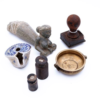 Lot 189 - An Indian carved stone temple door bracket in...