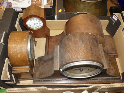 Lot 131 - An early 20th century oak cased mantel clock,...