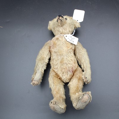Lot 197 - An early 20th century blond mohair bear, with...