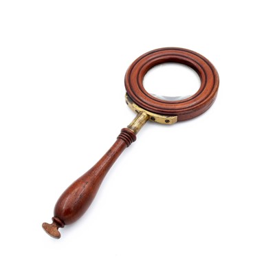 Lot 233 - An early 20th century mahogany and brass...