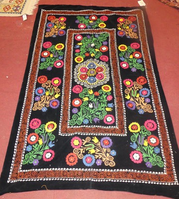 Lot 750 - An embroidered Suzani panel, Uzbekistan,...