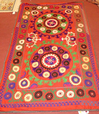 Lot 753 - An embroidered Suzani panel, Uzbekistan,...