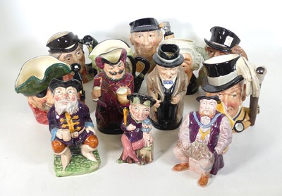 Lot 155 - A collection of character jugs, to include...
