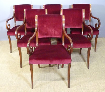Lot 692 - A set of seventeen mahogany scroll armchairs