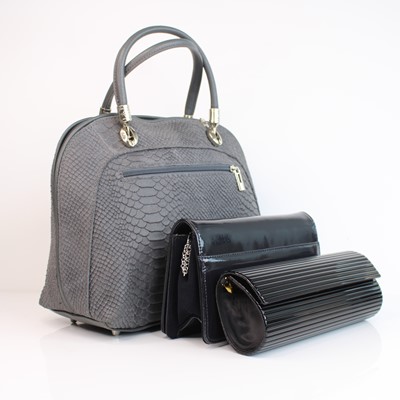 Lot 301 - A group of three handbags, comprising a grey...