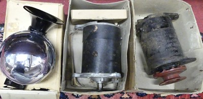 Lot 125 - A Lucas 12v dynamo, the casing impressed...