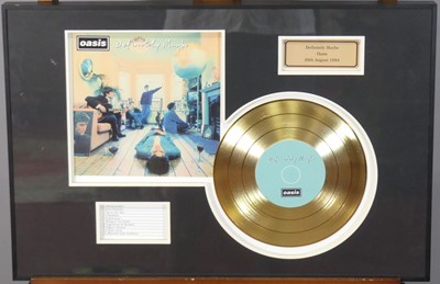 Lot 553 - Oasis interest - a reproduction gold disc for...