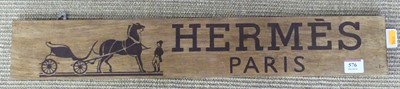 Lot 576 - A reproduction printed wooden advertising...