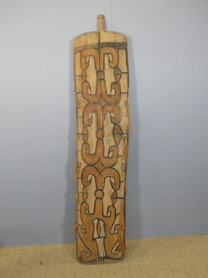 Lot 599 - A Papua New Guinea relief carved and...