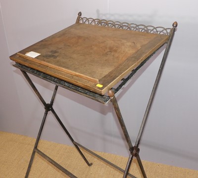 Lot 604 - A Victorian Aesthetic Movement iron X-framed...