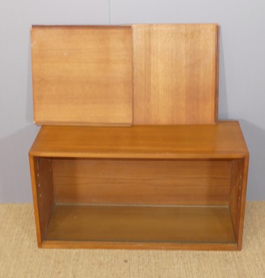Lot 607 - A 1970s Ladderax teak corner wall shelf,...