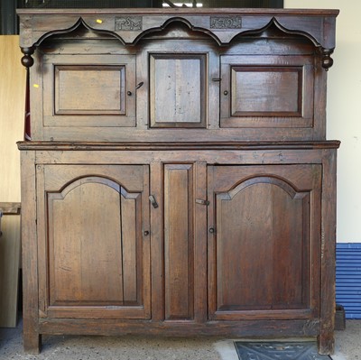 Lot 617 - An antique joined oak court cupboard, having...