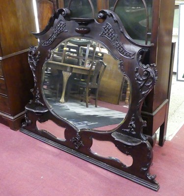 Lot 619 - An early 20th century floral relief carved...