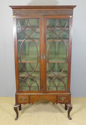Lot 620 - An early 20th century mahogany double door...