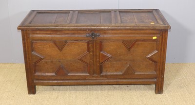Lot 626 - An 18th century joined oak two-panelled hinge...