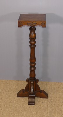 Lot 631 - An Old Charm oak plant stand, h.92cm