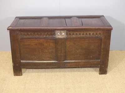 Lot 643 - An 18th century joined oak two panelled hinge...