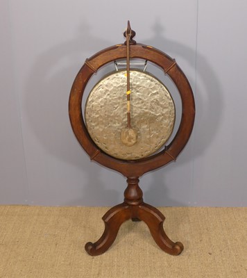 Lot 648 - A late Victorian oak freestanding gong, the...